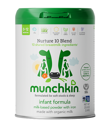 Munchkin Nurture 10 Blend infant formula container with green lid, showing a cow illustration and text indicating milk-based powder with iron for ages 0-12 months.